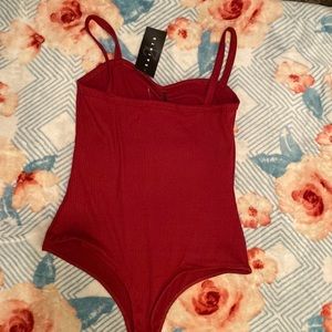 I’m selling a red/burgundy top from 21 saints never used with tag